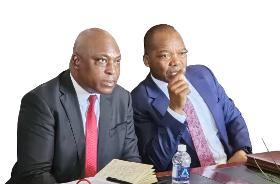 Incoming Reserve Bank Of Zimbabwe Governor Dr John Mushayavanhu Left And His Predecessor Dr John Mangudya In A Conversation At A Recent Press Conference In Harare